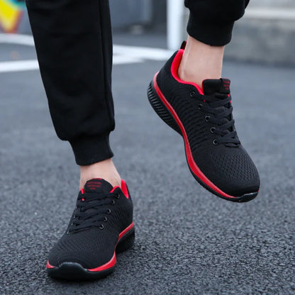 Herr- och dam-sneakers i stickat material, andningsbara sportskor för löpning, promenader och gym