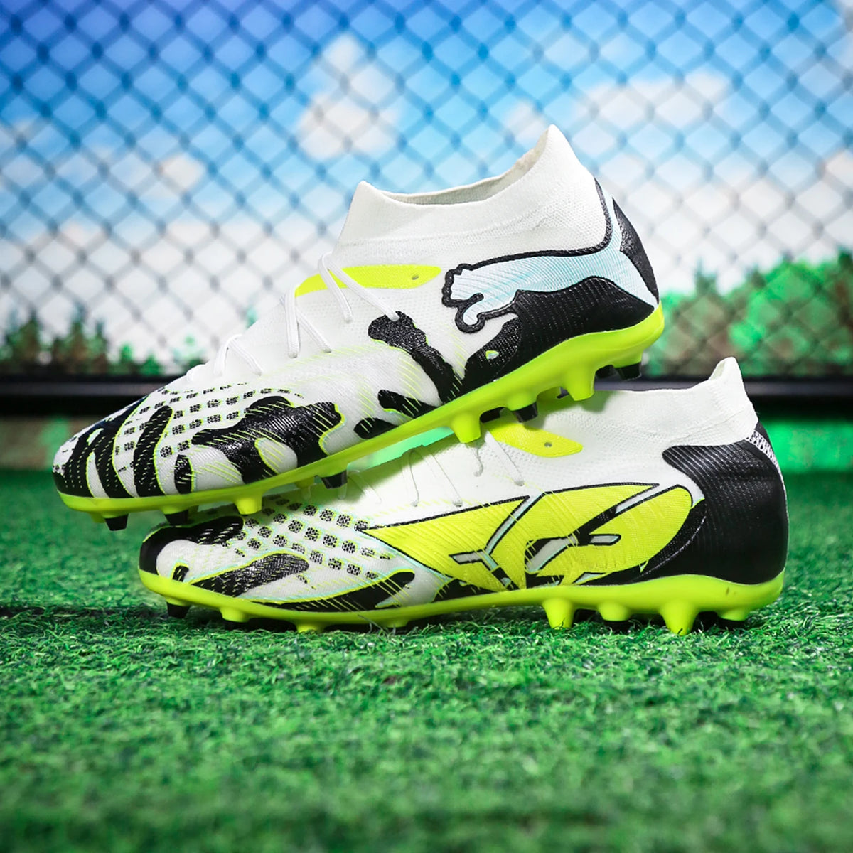 Chaussures de football Puma Future 9 Mid-Range MG (crampons courts en caoutchouc) 108952-01
