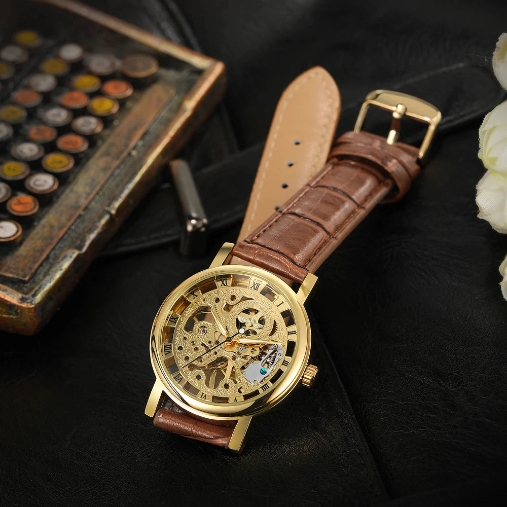 T-Winner Popular Lovers Skeleton Design Gold Watches Mechanical Hand Wind Movement PU Leather Strap Wristwatch for Men Women